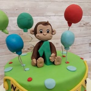 torta curioso come george in pasta di zucchero